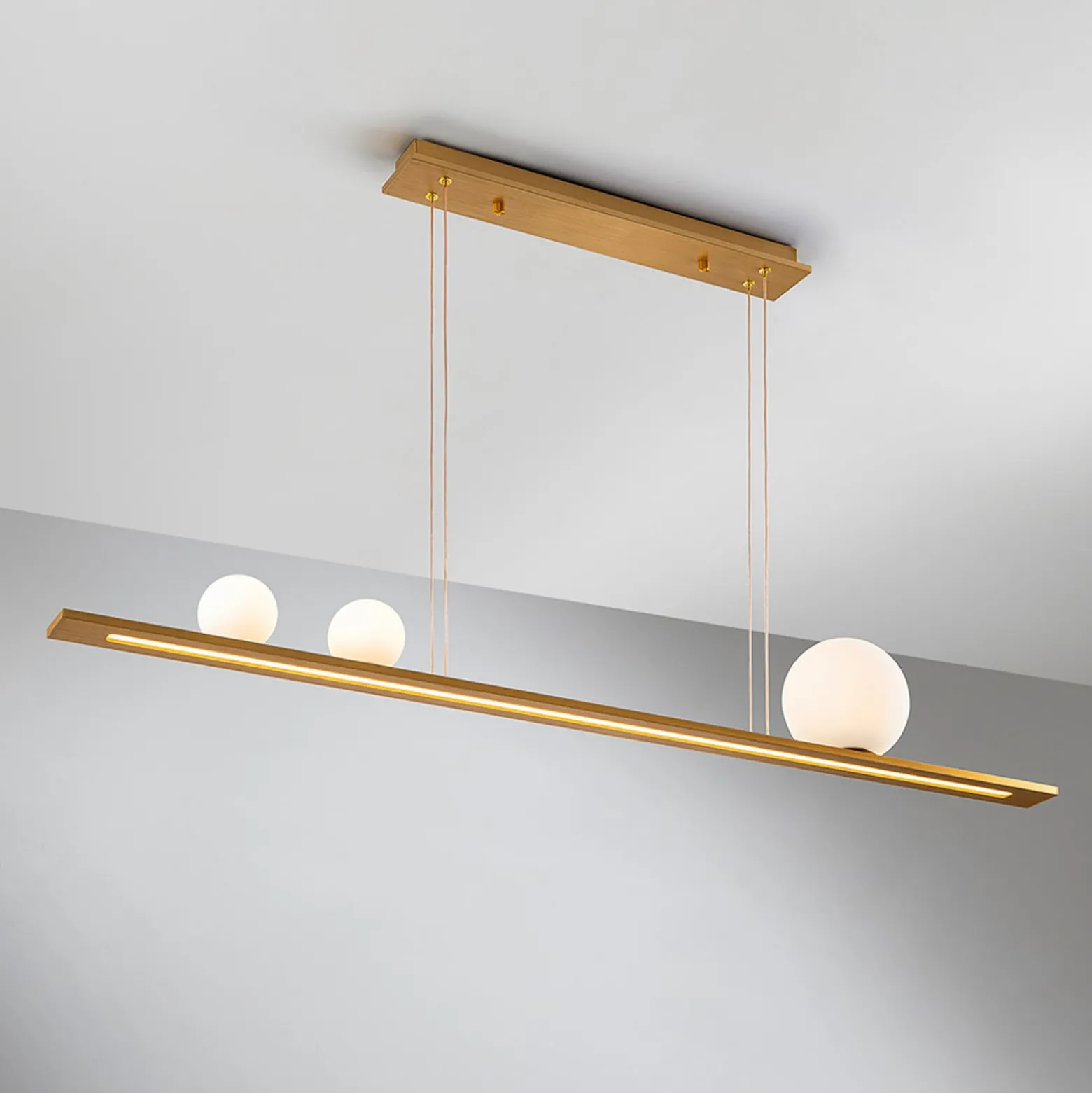 LED-Pendellampe Mila, goldfarben, Länge 120 cm, 3-flg.