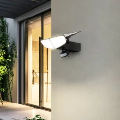 Lindby LED-Solarwandleuchte Naelin, schwarz, Sensor, IP44