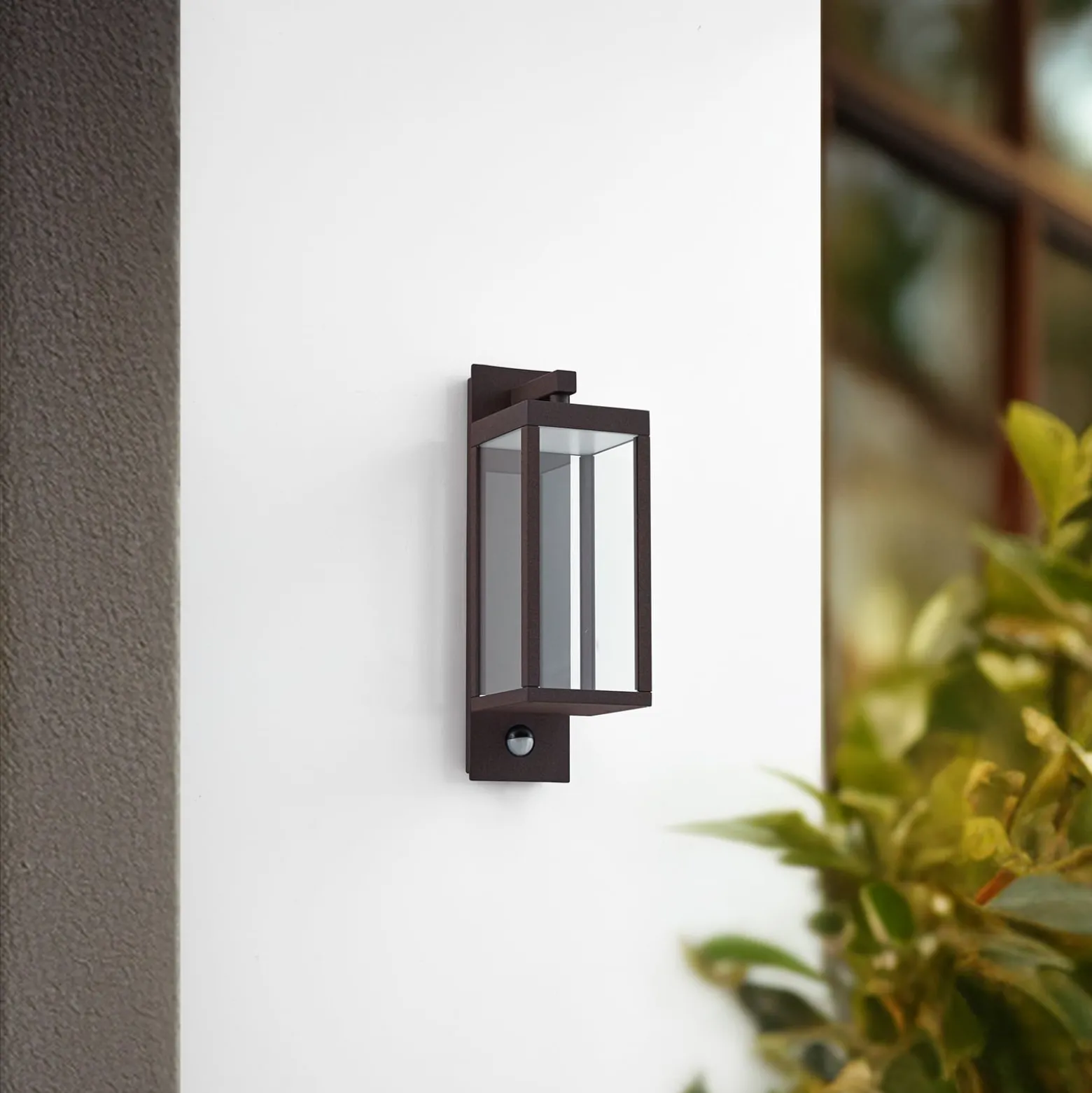 Lucande LED-Außenwandlampe Ferdinand, rost, Sensor, IP54