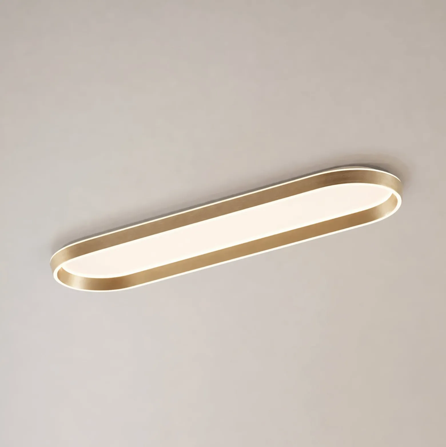 Lucande LED-Deckenlampe Rylan, 112 cm, messing, dimmbar, CCT