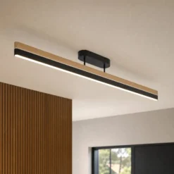 Lucande LED-Deckenleuchte Holven, schwarz/Holz, CCT, dimmbar